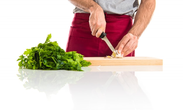 Cook chopping vegetables
